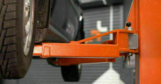 Put your car on a vehicle lift, inspection pit or a car ramp