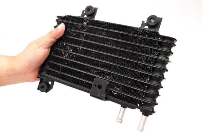 What is an oil cooler in an engine